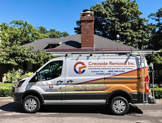 Stanton Chimney Sweep technician removing creosote safely in Stanton, CA